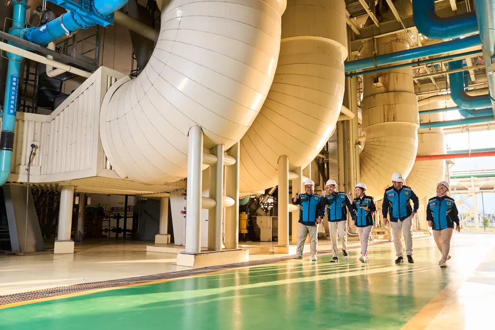 HBAP engineers walking through the turbine hall